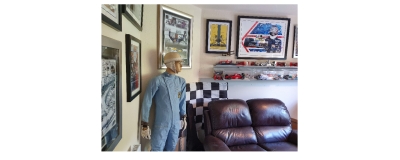 Sir Stirling Moss race suit back in office 
